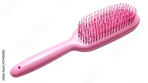 A pink brush delicately rests on a pristine white surface