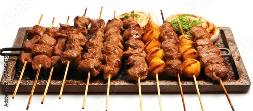 Hand Holding Sticks Of Barbecue Satay, AI generated