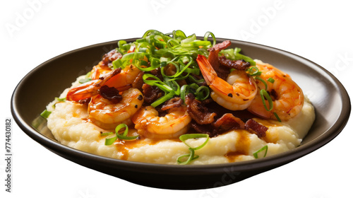 A delectable plate of creamy mashed potatoes topped with succulent shrimp, a harmonious blend of land and sea flavors