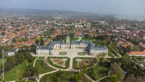 The Keszthelyi Festetics-kastély, or Festetics Palace of Keszthely, is a magnificent Baroque palace located in Keszthely, Hungary, on the shores of Lake Balaton captured from a drone