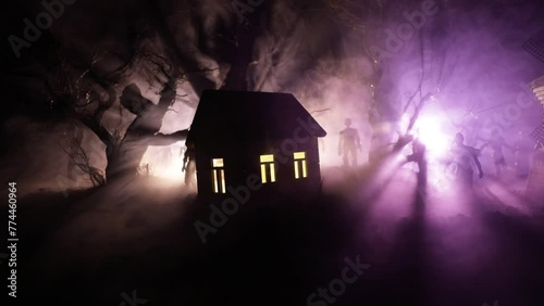 Silhouette of person standing in the dark forest with light. Horror halloween concept. strange silhouette in a dark spooky village