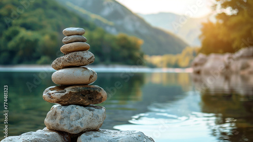 Balancing stones and landscape with lake 