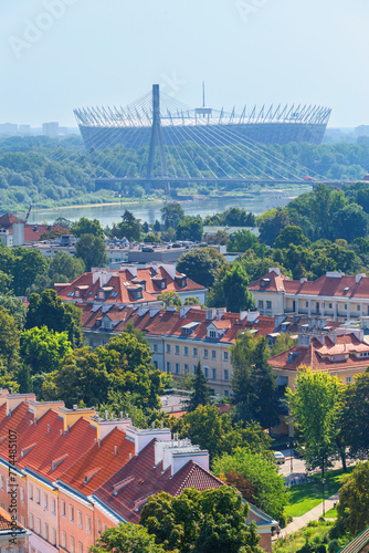 Cityscape - top view of neighbourhood of Powisle near the Vistula river and the Stadion Narodowy in the background, in center of Warsaw, Poland