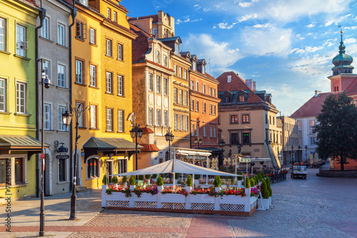 Cityscape - view of the Old Town Market Place with cafes and restaurants in the historical center of Warsaw, Poland