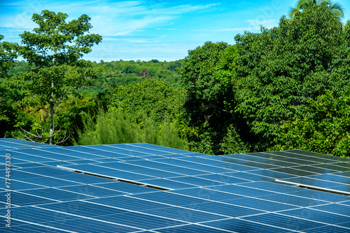 Solar energy panels in a rural green area in Brazil.