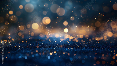 Abstract gold and navy blue background with sparkling particles