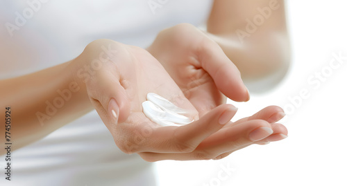 Healthcare concept. Closeup shot of young woman hands applying moisturizing hand cream.