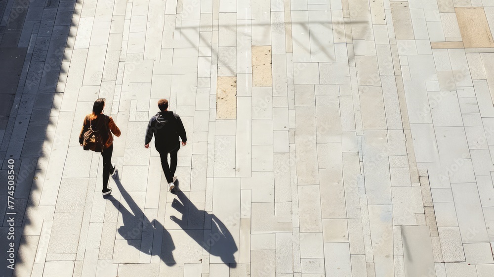 two individuals silhouette walking, distanced perspective two individuals silhouette walking, distanced perspective