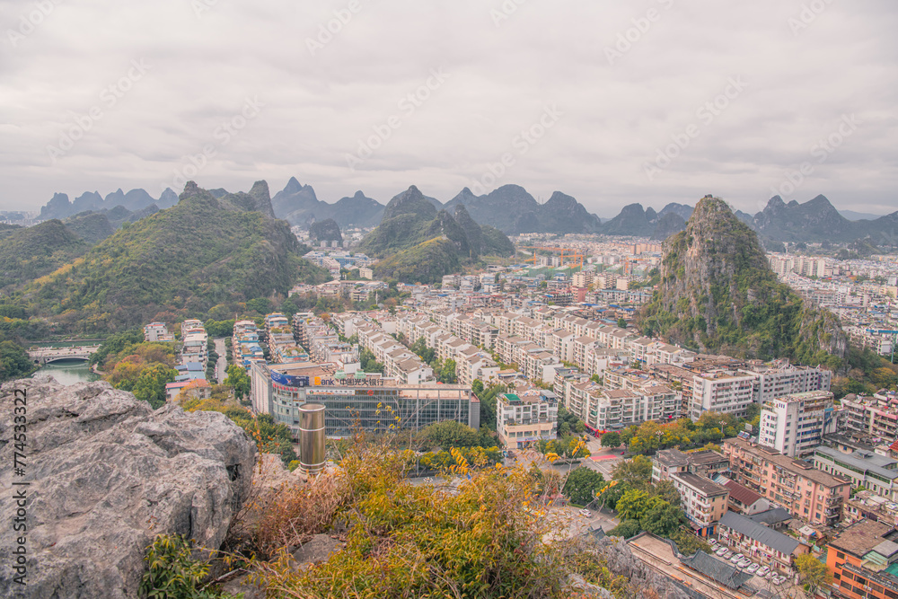aerial of Guilin town with sunset glow ,beautiful karst mountain scenery,China