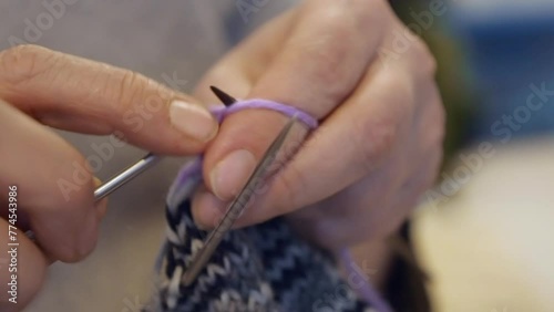 Close-up view: Tubular knitting yarn with a stockinette stich pattern photo