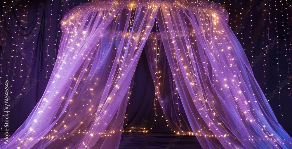 A whimsical canopy made of delicate lilac chiffon adorned with ling fairy lights adds a touch of enchantment to this podium and its . . - obrazy, fototapety, plakaty 