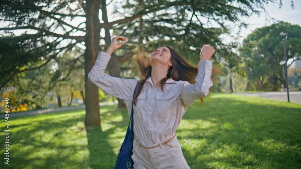 Joyful woman strolling sunny park feeling freshness closeup. Outdoor activity Joyful woman strolling sunny park feeling freshness closeup. Outdoor activity