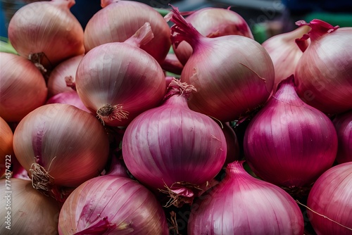 Fresh giant onions create a vibrant display at the market photo