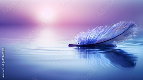 A feather is floating on the surface of a calm body of water. The water is a deep blue color, and the sky is a soft pink color. Concept of tranquility and peace