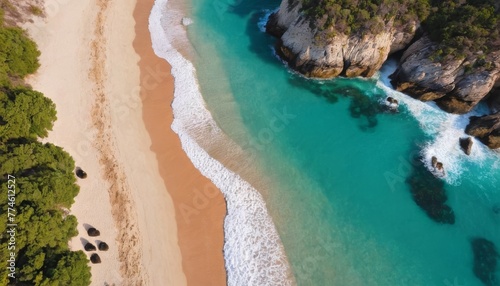 Turquoise water with wave with sand beach background aerial top view in sunset. Concept summer