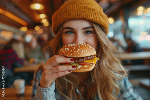 Woman enjoying fast food Eating sandwiches and hamburgers  