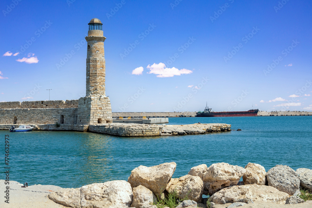 Iconic Egyptian Lighthouse at Old Venetian Port of Rethymno, Crete island destination Greece.