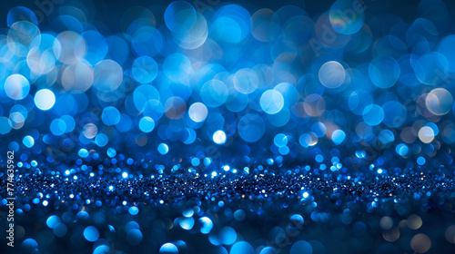 Glitter, sparkle defocused blurred blue background with bokeh lights,colorful festive abstract blurred bokeh background with circles,Glittering particles abstract background for use in design © sami