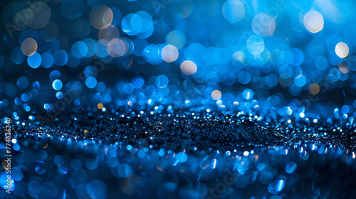 Glitter, sparkle defocused blurred blue background with bokeh lights,colorful festive abstract blurred bokeh background with circles,Glittering particles abstract background for use in design © sami