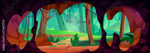 View on jungle from inside cave with stone walls and stalactites. Cartoon vector landscape of summer rain forest with trees and liana vines through cavern hole entrance. Prehistoric underground grotto © klyaksun