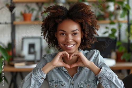 Happy business woman shows her love and gratitude. Video call headshot view thankful African American lady in shirt sitting in home office, looking at, Generative AI