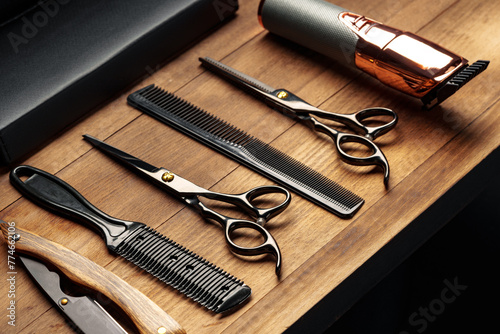 Professional Barber Tools Laid Out on Wooden Surface for Mens Grooming Session
