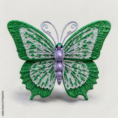 openwork lace green butterfly on a white background. photo