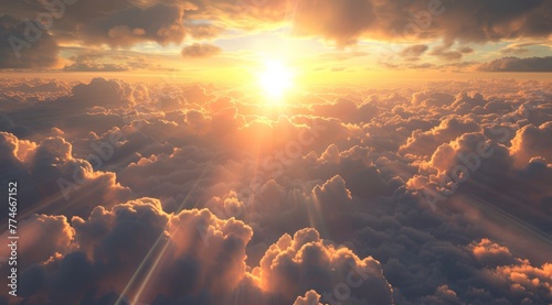  The sun shines brightly through white, fluffy clouds in the sky The sun's rays penetrate the clouds at a distance