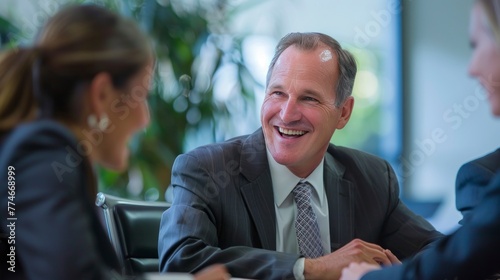 Smiling business executives in a meeting