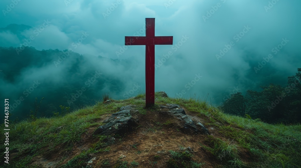   A hilltop cross amidst foggy day's mist, sky backdrop shrouded in mystery - obrazy, fototapety, plakaty 