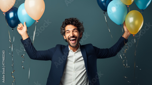 heerful Mature Man with Balloons Enjoying Party photo