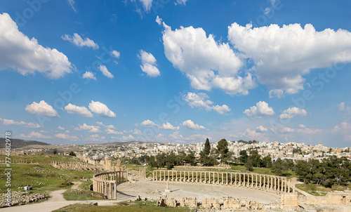 Forum (Oval Plaza) in Gerasa (Jerash), Jordan. Was built in the first century AD. Against the background of a beautiful sky with clouds. #774682978