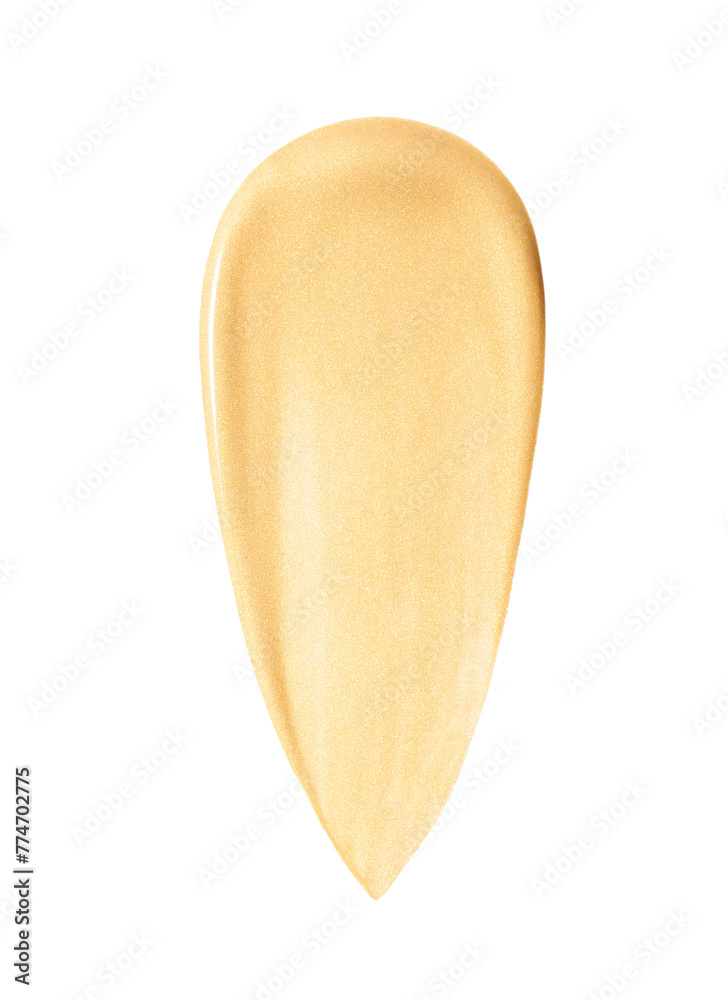 creamy cosmetic texture of golden shining color cosmetic smear on a white background