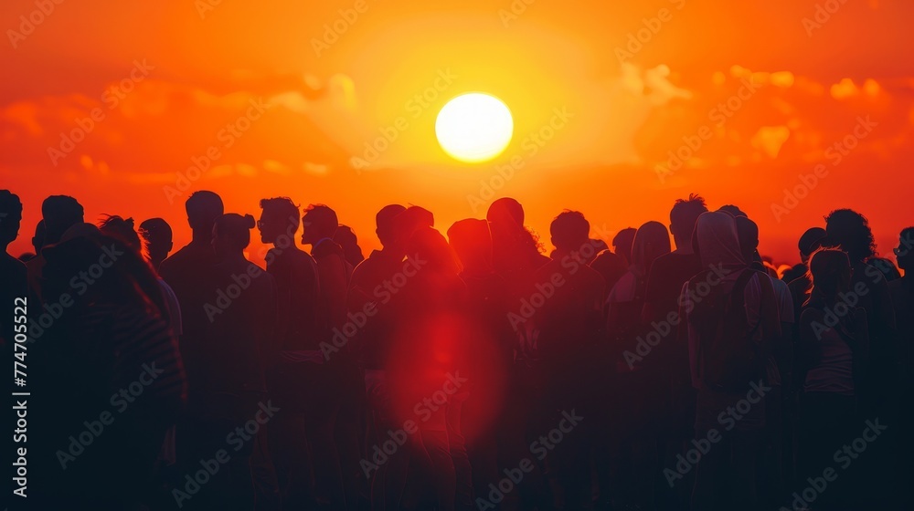 A large group of people are gathered around a sun, with the sun being the main focus of the image. The people are standing in a line, with some of them being closer to the sun and others further away
