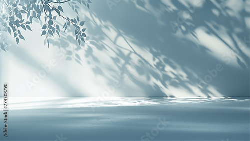 minimalistic abstract gentle light blue background for product presentation with light and shadow on wall.