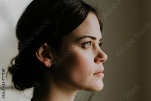 Portrait of a beautiful young woman with dark hair and brown eyes