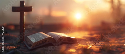It is a blurred version of an open Bible with a palm cross on a sunrise background photo