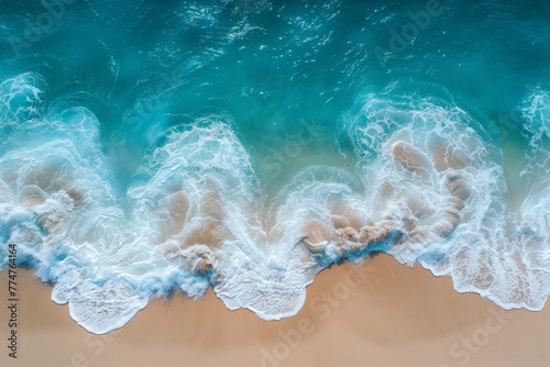 Beautiful turquoise water and white foam on the shore in an exotic location. Aerial photography from above.