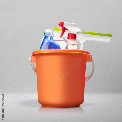 Set of cleaning stuff in the bucket