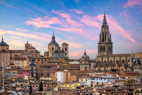 Detailed view from a distance of the monumental historic center and declared a World Heritage Site by UNESCO of the city of Toledo, Spain, at dusk photo