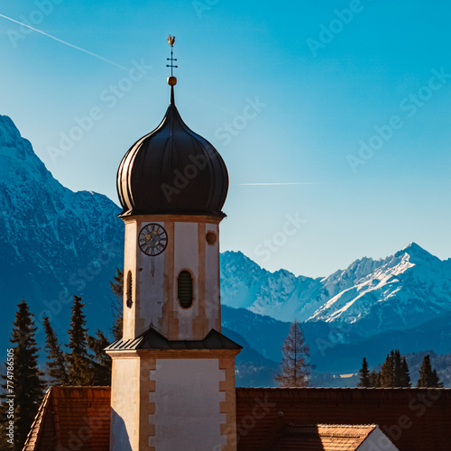 Church on a sunny winter day at Wallgau, Garmisch-Partenkirchen, Werdenfelser Land, Bavaria, Germany photo