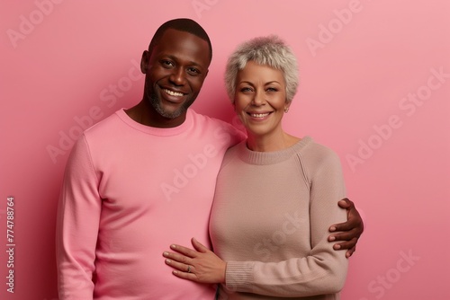 Affectionate Mature Couple Embracing With Warm Smiles