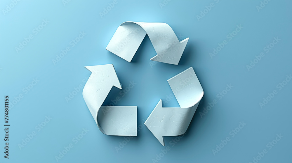 Recycle sign made of paper on a blue background isolated. Recycle sign made of paper on a blue background isolated.