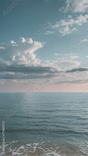 Coastal horizon in soothing pastels. Minimalist wallpaper for social media. Cloudy sky above serene seascape. Peaceful and simple.
