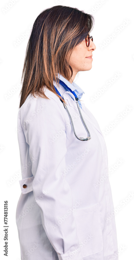Young beautiful woman wearing doctor stethoscope and glasses looking to side, relax profile pose with natural face with confident smile. Young beautiful woman wearing doctor stethoscope and glasses looking to side, relax profile pose with natural face with confident smile.
