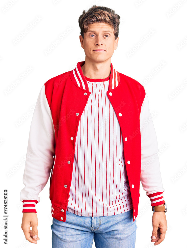 Fototapeta premium Young handsome man wearing baseball uniform relaxed with serious expression on face. simple and natural looking at the camera.
