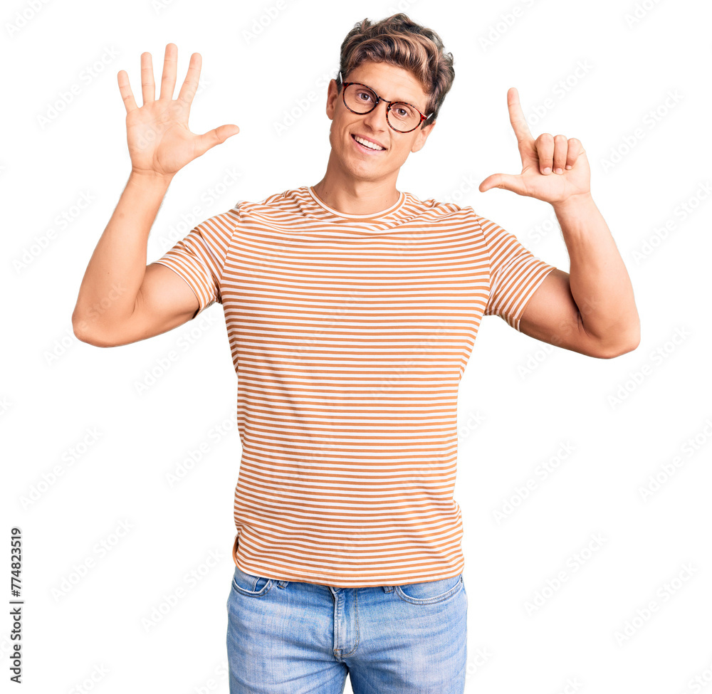 Young handsome man wearing casual clothes and glasses showing and pointing up with fingers number seven while smiling confident and happy. Young handsome man wearing casual clothes and glasses showing and pointing up with fingers number seven while smiling confident and happy.