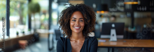 Young african american business woman smiling closeup portrait businessperson blur office background