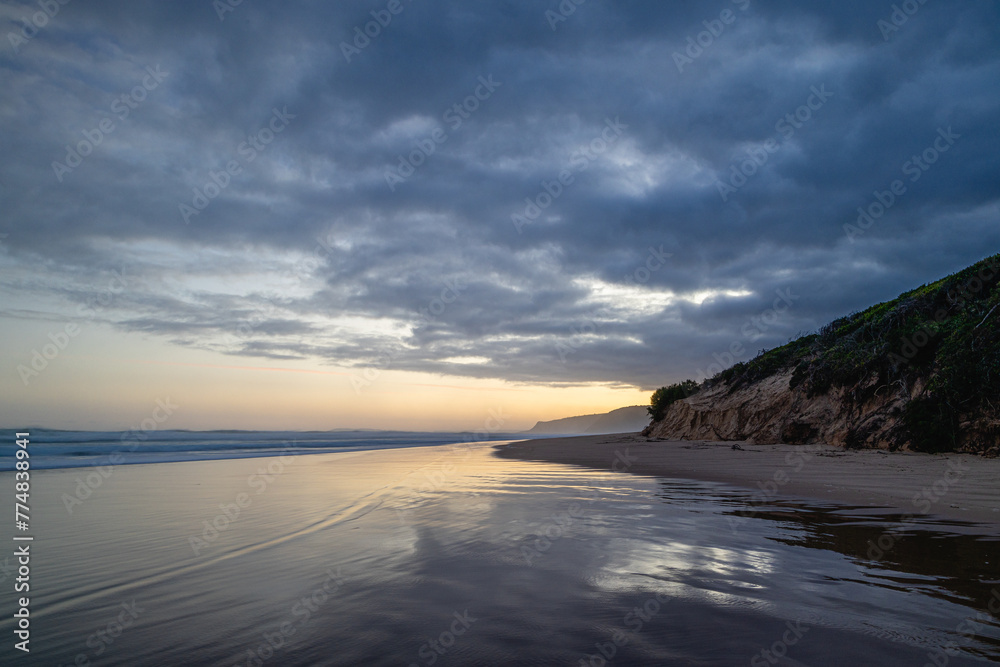 sunset on the beach of the indian ocean at nature valley tsitsikamma national park garden route south africa