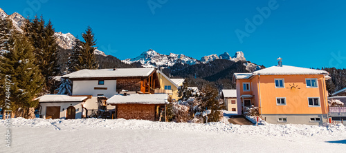 Alpine view on a sunny winter day at Graen, Tannheimer Tal valley, Reutte, Tyrol, Austria photo